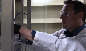 Scientist working in a lab as a link to a video about nanodiamonds